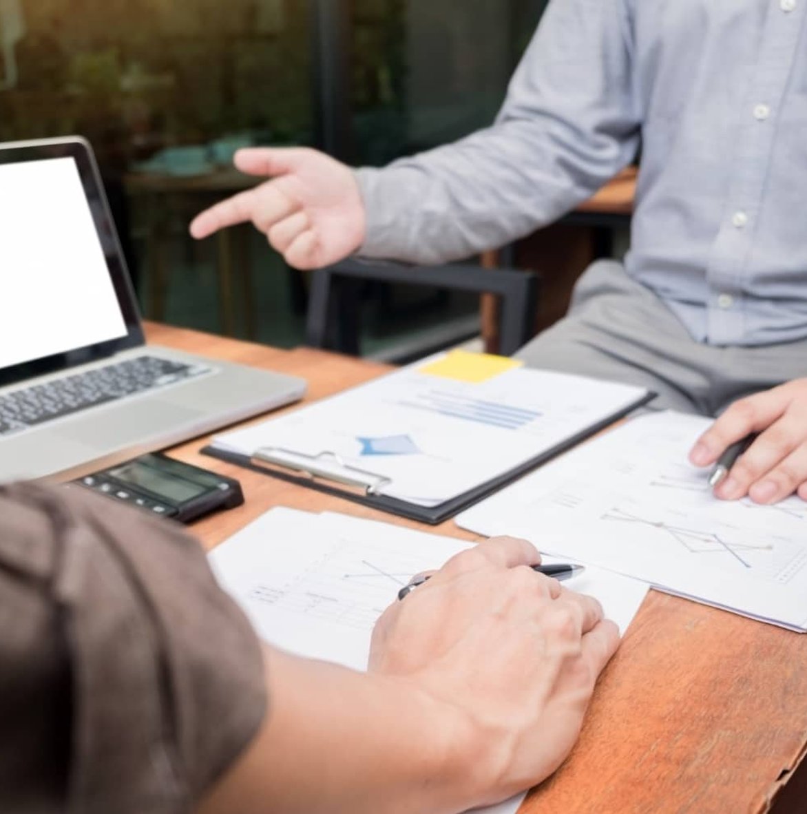 Friendly accountant meeting with client