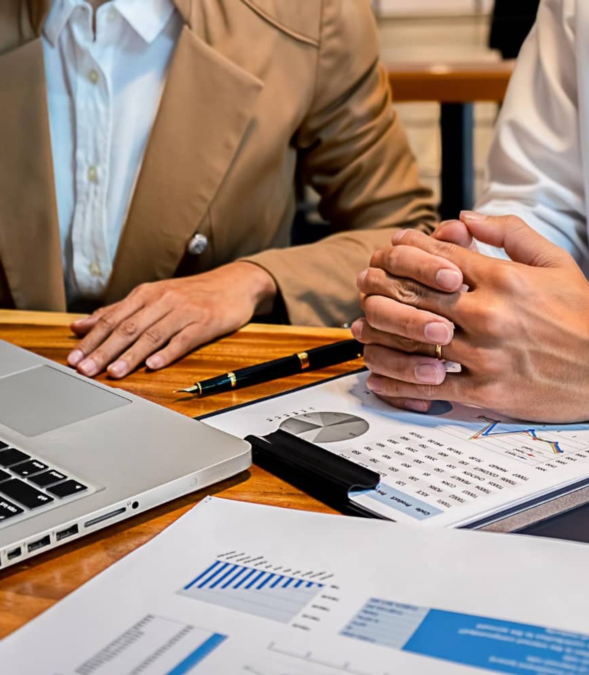 MJS Tax Solutions team analysing tax minimisation strategies for a client